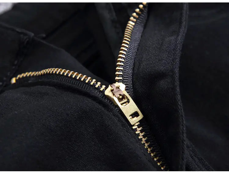 Zippered Holes Elastic Trend Denim Pants