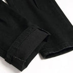 Schwarze Python-Jeans